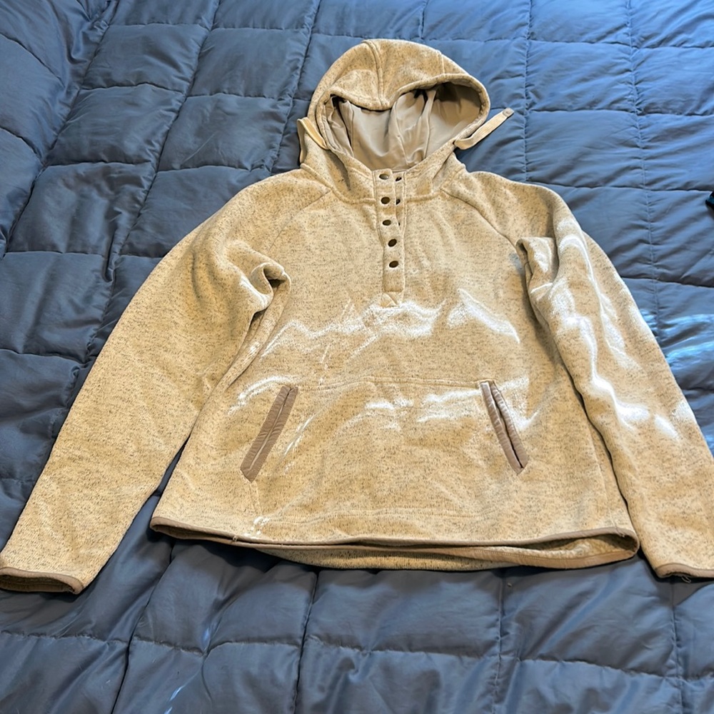 Lightly worn sweater with button up front